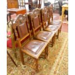 Set of 4 carved oak Lion mask and leather dining chairs