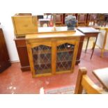 Oak and leaded light cabinet