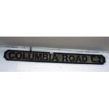 Wooden 'Columbia Road E2' street sign