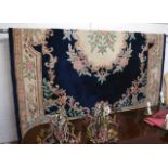 Good quality patterned Chinese wool carpet (approx 12' x 8') with underlay