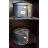 2 old metal hat boxes