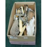 Box of plated cutlery and servers