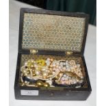 Wooden box of costume jewellery