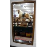 Gilt framed and bevelled glass wall mirror