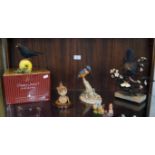 Collection of country artist bird figures