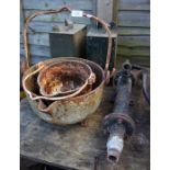 Cast iron water pump, 2 metal petrol cans & 2 iron cooking pots