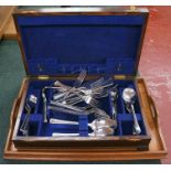 Oak cased canteen of cutlery and wooden tray