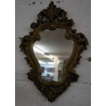 Small ornate gilt framed wall mirror