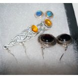 3 pairs of silver and stone set earrings