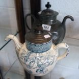 2 self poring tea pots, 1 pewter & 1 Doulton Burslem