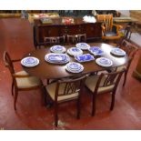 Mahogany regency style table and six chairs with matching serpentine sideboard