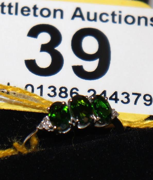 White gold green garnet & diamond set ring - Estimate £60 to £100