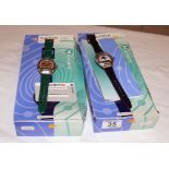 Two old Swatch watches with original boxes