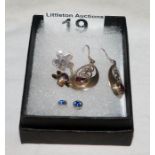 Three pairs of stone set earrings