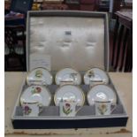 Boxed Royal Worcester coffee cans and saucers