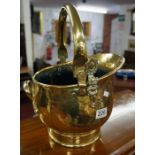 Brass coal scuttle with door knocker