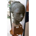 Bust of lady on wooden base