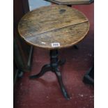 Small early oak tripod table