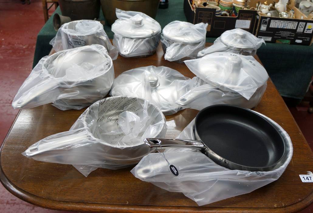 Collection of new 'Stellar' saucepans and frying pans