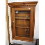 Pine and glazed wall cabinet