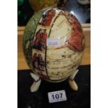 Decorative ostrich egg on stand