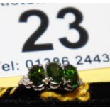 White gold green garnet and diamond set ring - Estimate £60 to £100