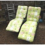 2 garden loungers with cushions