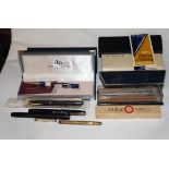 Box of fountain pens etc