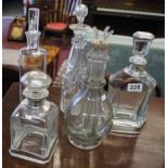 5 assorted glass decanters