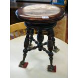 Unusual Victorian piano stool with glass feet