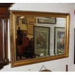 2 gilt framed and bevelled glass wall mirrors