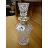 Cut glass decanter with hallmarked silver collar