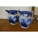 Pair of blue and white jugs