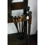 Collection of 7 old walking sticks