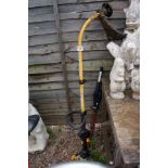 Petrol strimmer and attachment