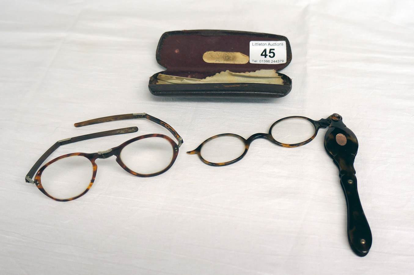 2 old pairs of spectacles