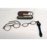 2 old pairs of spectacles