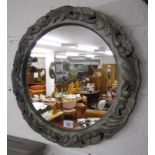 Circular carved frame wall mirror