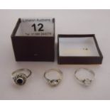 3 silver and stone set rings