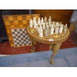 Eastern chess table and chess pieces with 2 further chess boards