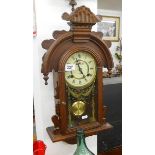 Small mahogany wall clock