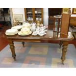 Victorian mahogany wind-out table