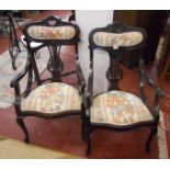 Pair of ebonised Edwardian armchairs