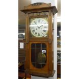 Edwardian oak wall clock