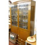 Large oak and leaded light cabinet