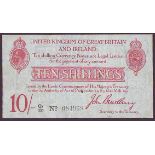 Ten shillings Bradbury T13.2 issued 1915 series Q1/20 084968, small hole and repair lower right,