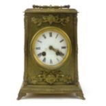 A French late 19th century brass cased mantle clock, circular enamelled dial on a striking eight day