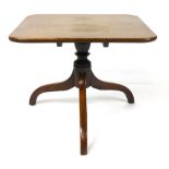 A 19th century oak square occasional table, rounded corners raised on a turned column and down swept