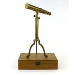 A modern brass table telescope on a trip