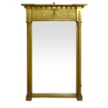 A Neo-Classical gilded pier mirror, with central rectangular plates flanked by fluted columns. h. 96